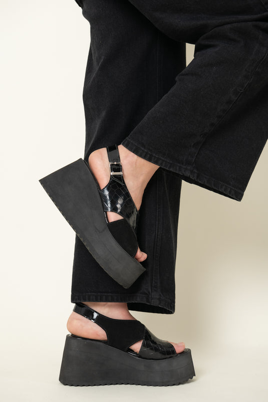 Sandalia cruzada alta